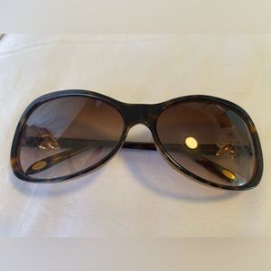 Tiffany’s sunglasses, brown w/ gold embellishments, sunglass case +accessories.